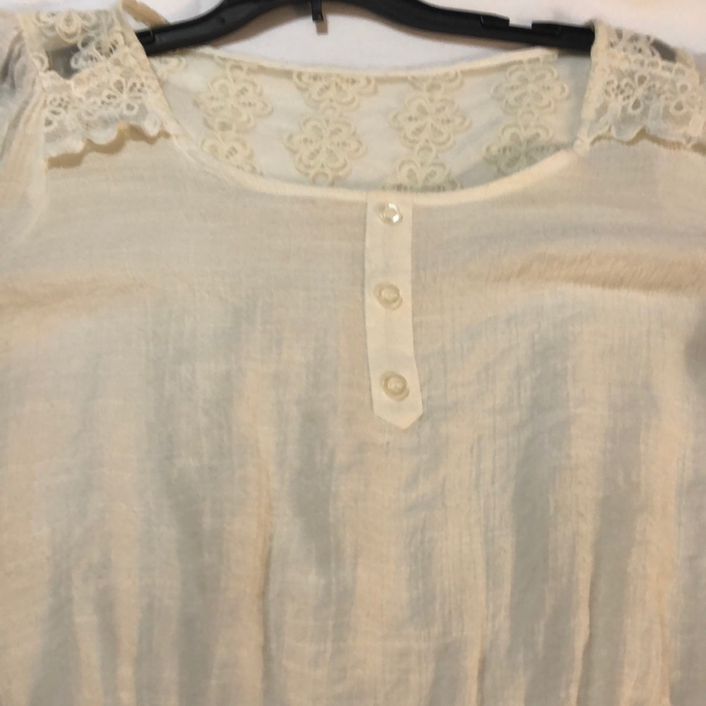 Lacy sheer holiday top long sleeves .